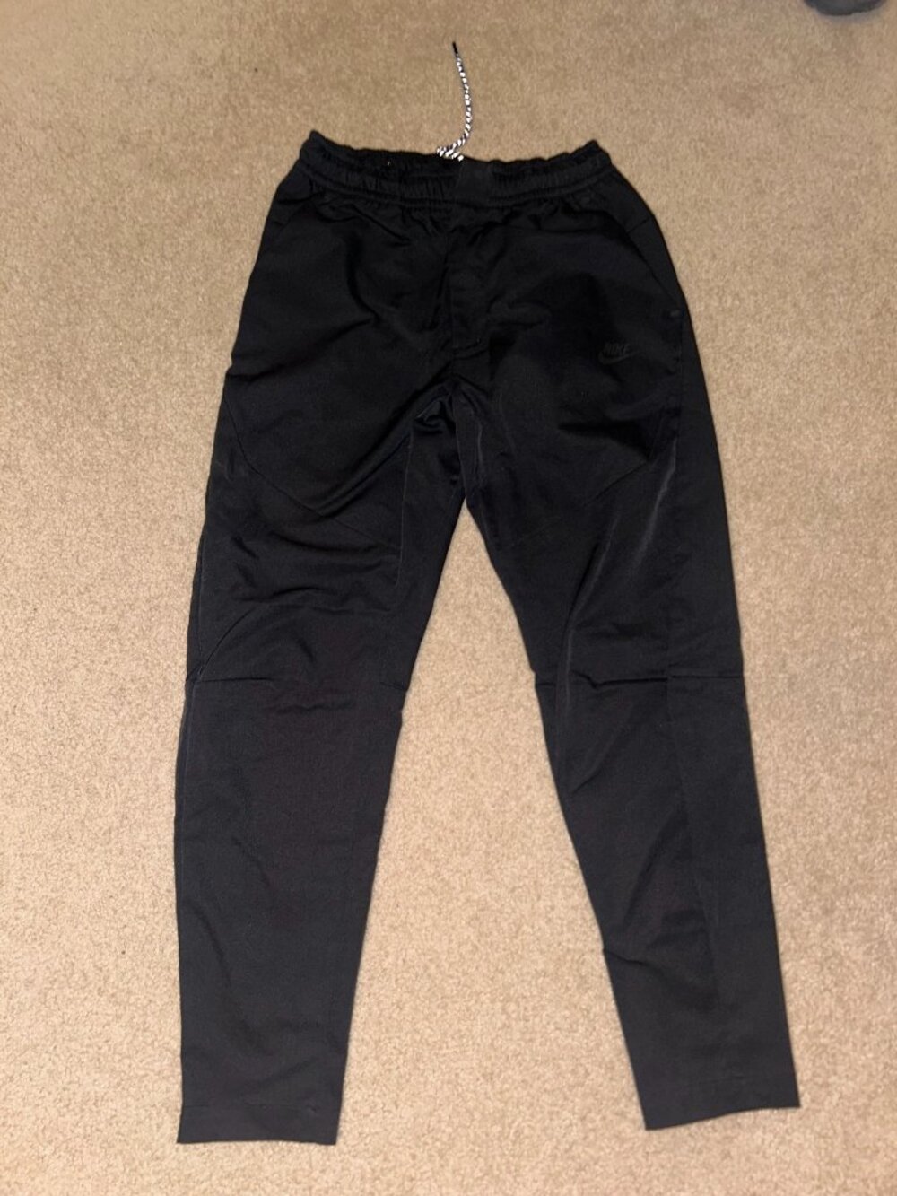 Nike woven tapered track pants